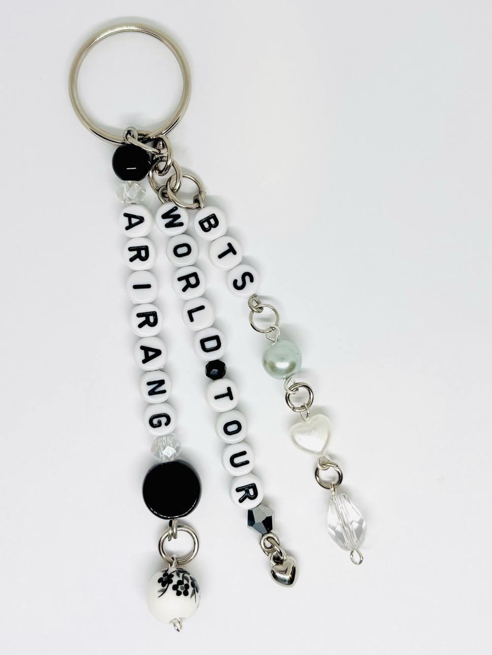BTS WORLD TOUR ARIRANG BLACK WHITE FLORAL BEADED SILVER KEYCHAIN